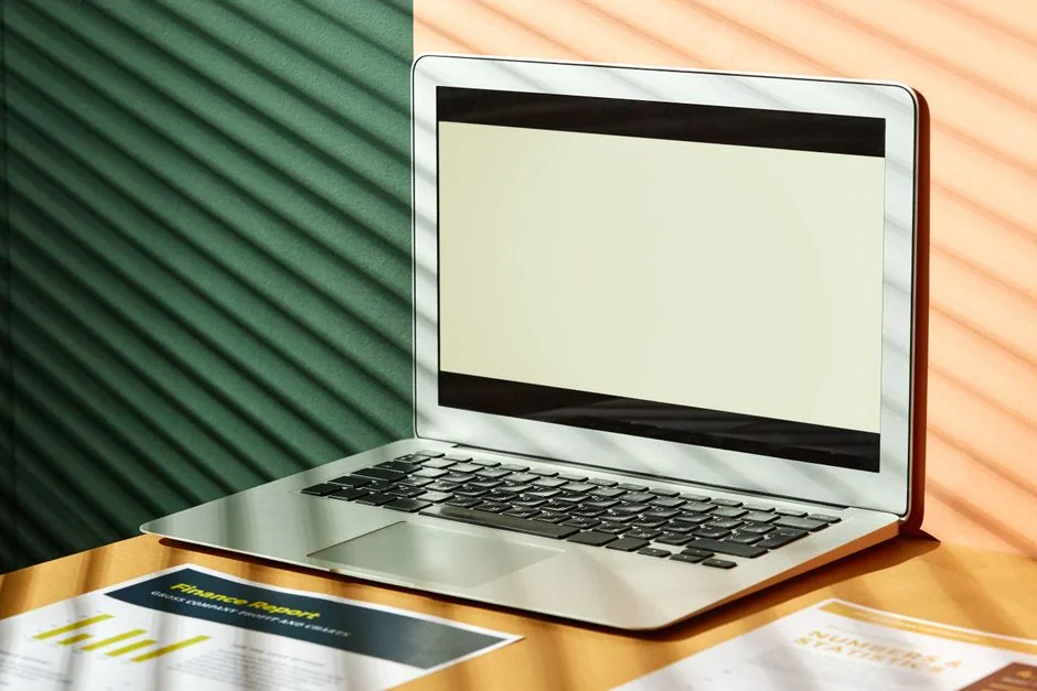 Close-up of a laptop showing the Pexels login interface with a blurred background, creating a moody tech scene.